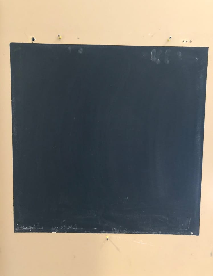 Chalkboard paint on wall.