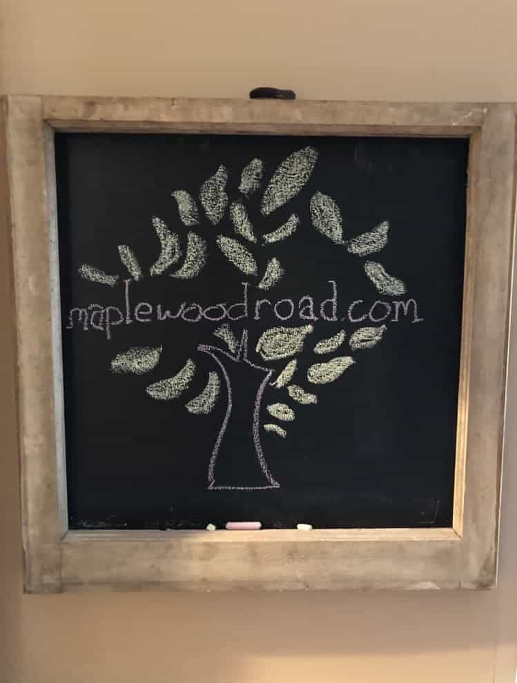 Rustic chalkboard on wall.