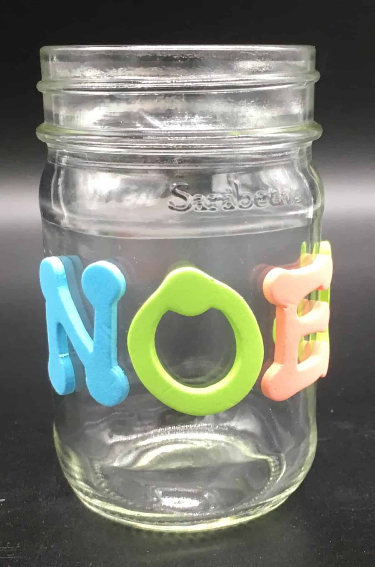 Letters on jar.