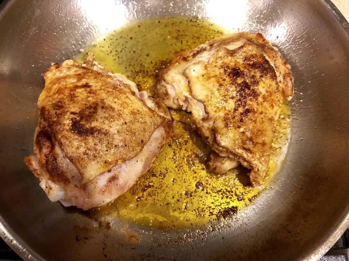 Chicken seasoned with paprika, salt, and pepper.