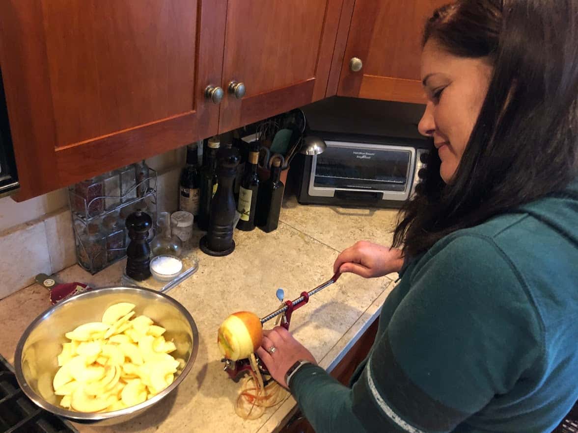 Viana prepping apples for apple pie.