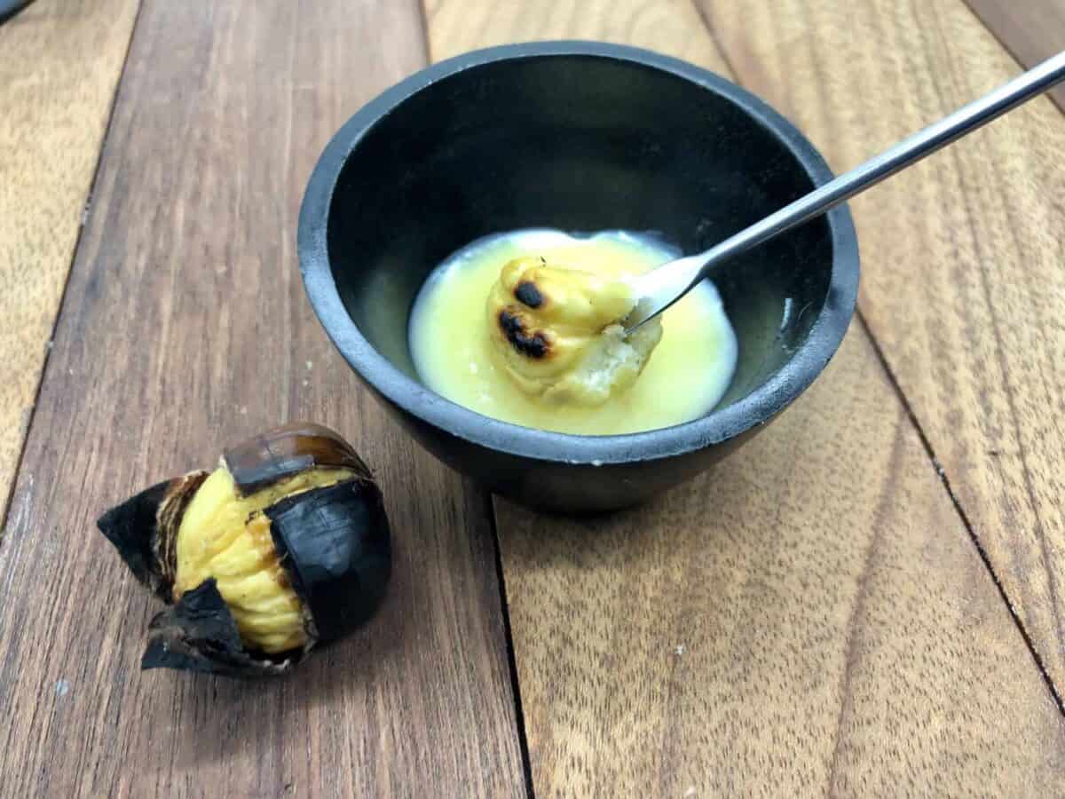 Roasted chestnuts dipped in melted butter.