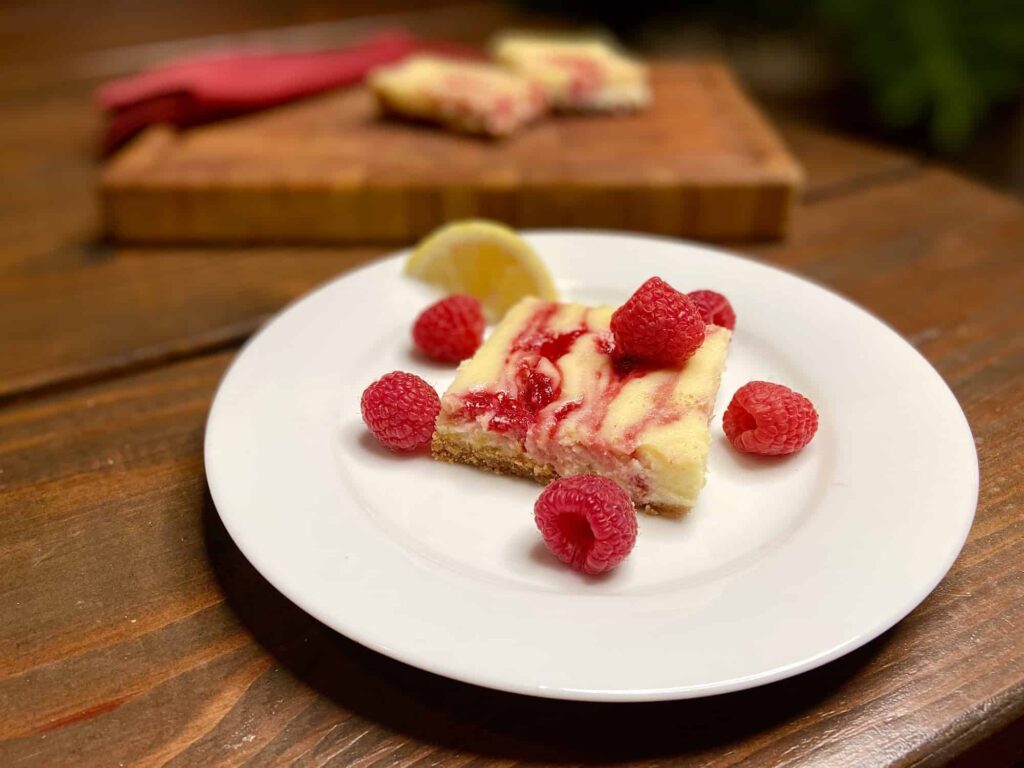 Lemon Raspberry Cheesecake Bars - You’re gonna want to make extra…(Photo by Viana Boenzli)