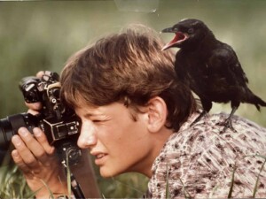 About Erich - 1983 in Switzerland, with my hand-raised Carrion Crow (Corvus corone) named Gorky