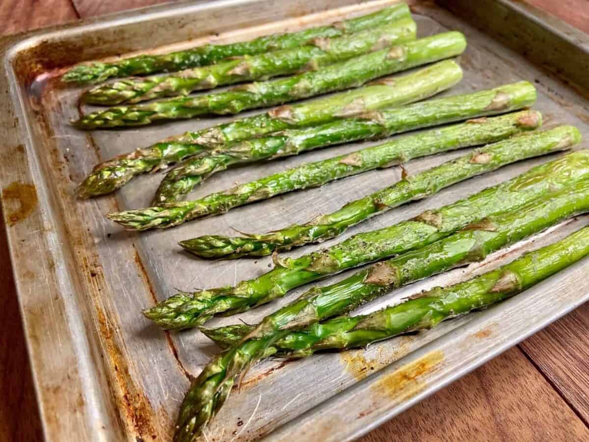 Roasted carrots on a baking sheet.