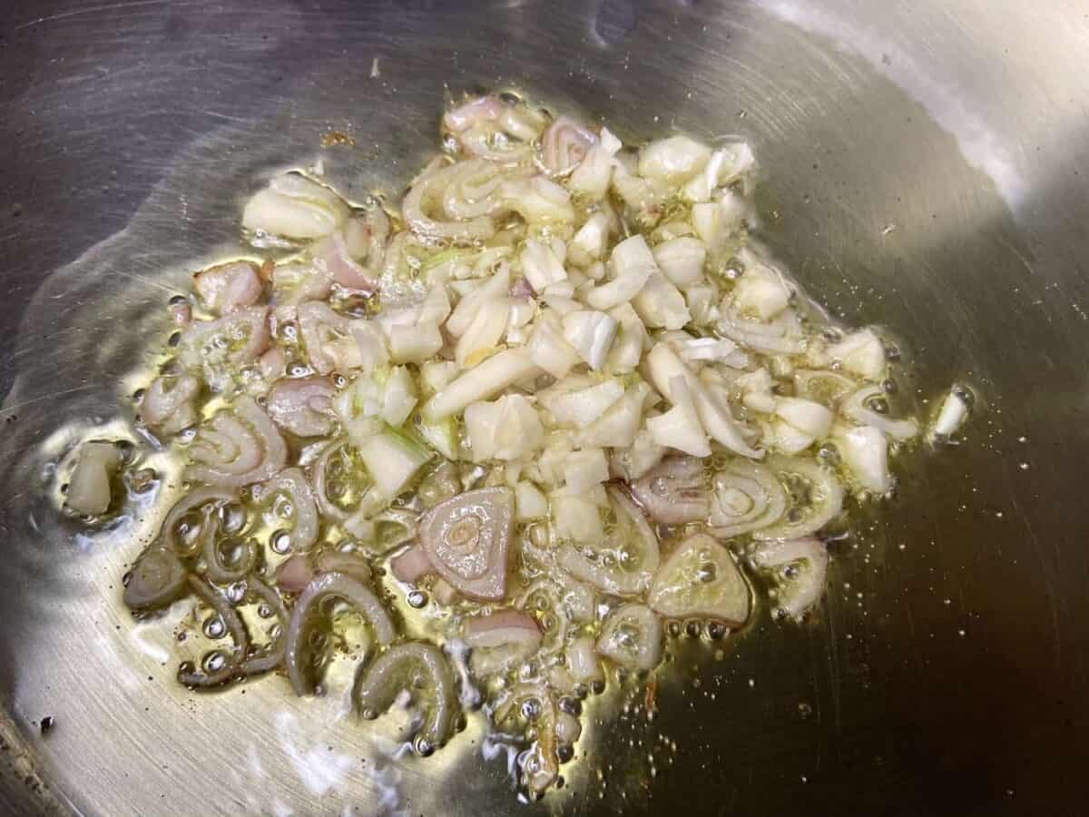 Saute first the shallots, then garlic - not together.