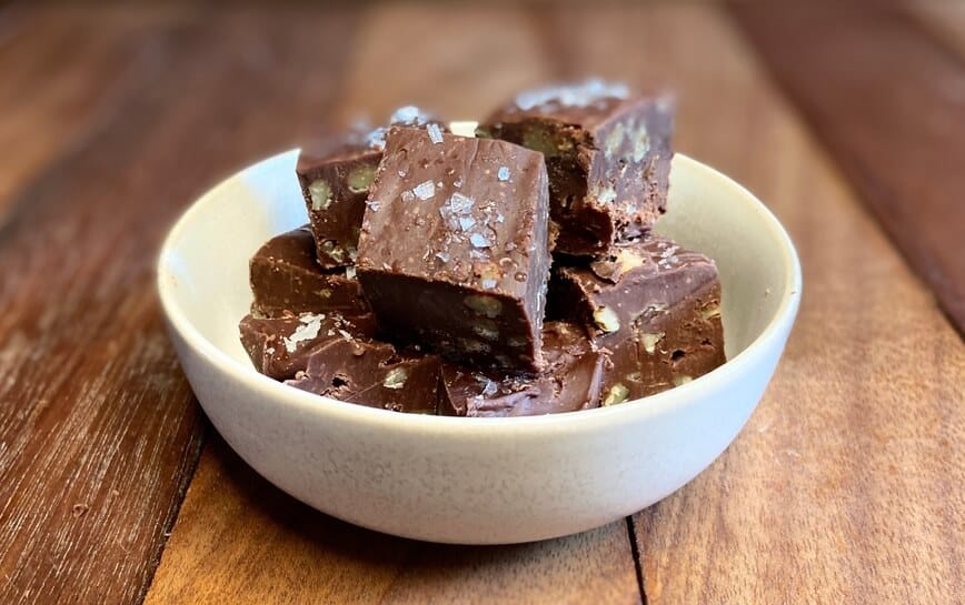Several pieces of fudge in a small bowl.