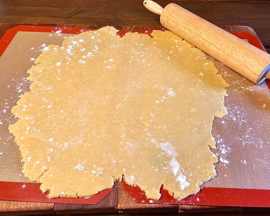 Rolling out pastry crust.