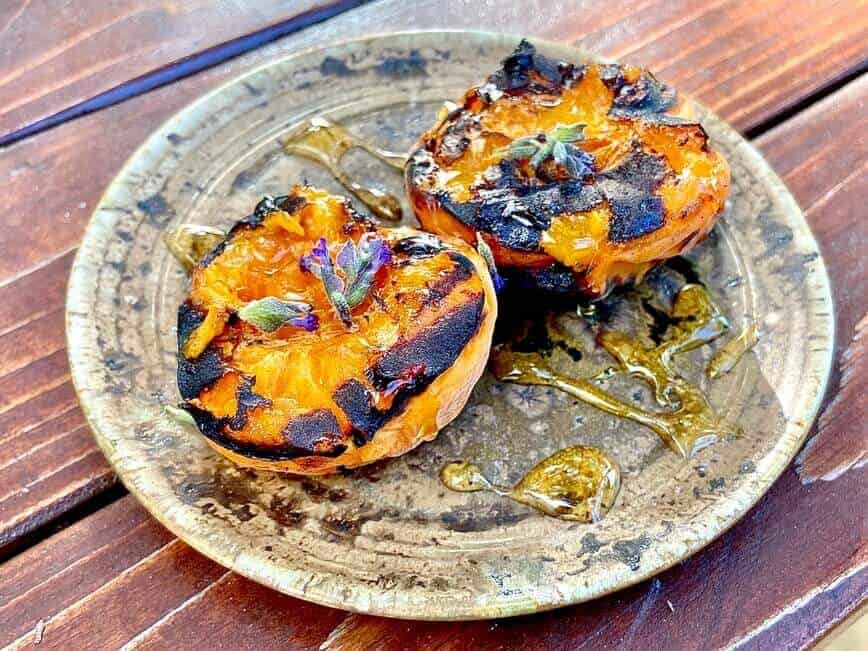 Grilled apricots with honey.