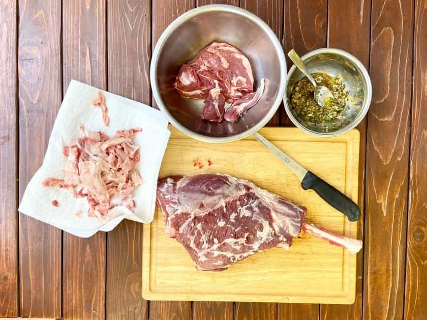 Lamb, knife, and cutting board.
