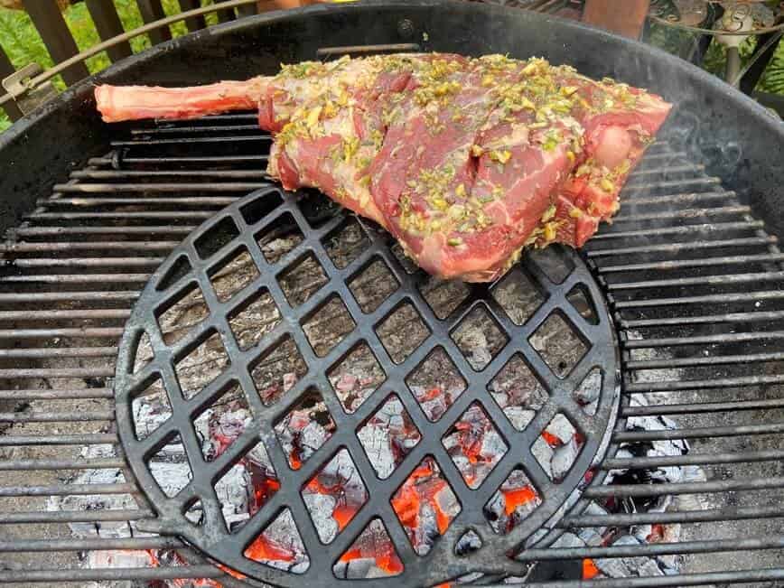 Grilled Leg of Lamb - starting to cook leg of lamb on grill (Photo by Erich Boenzli)