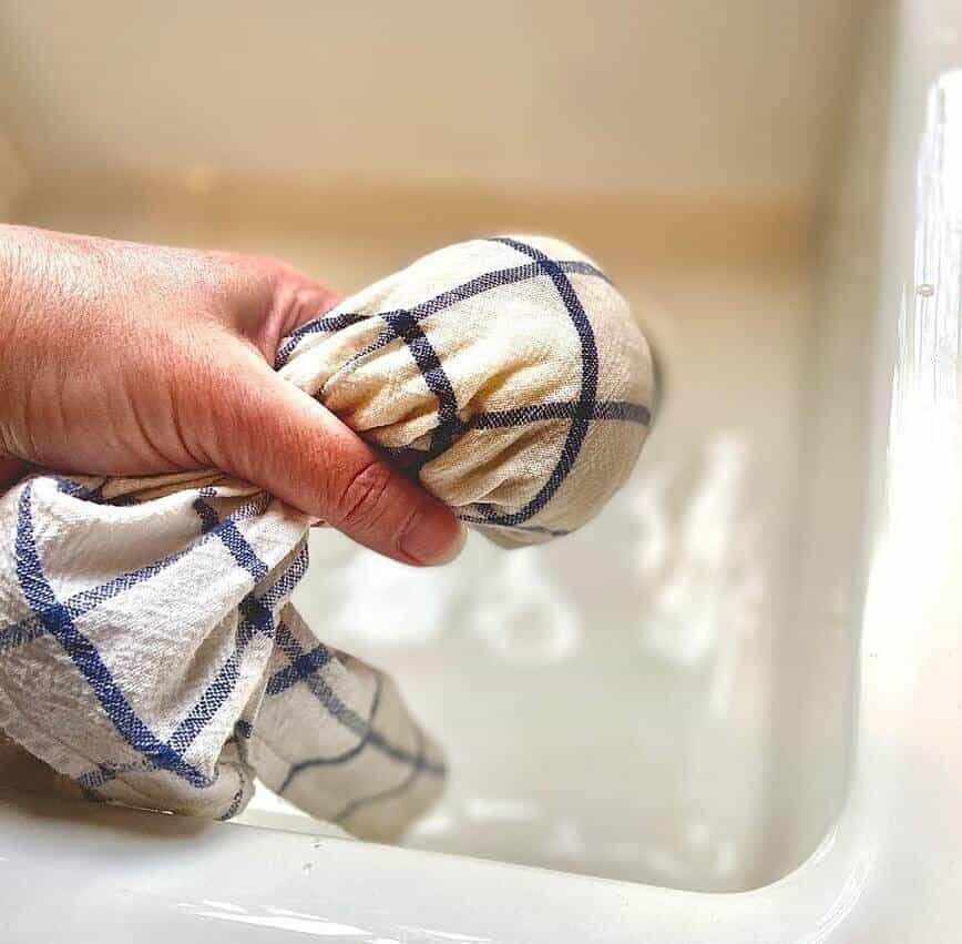 Squeeze, squeeze, and squeeze the water out again in a tea towel.