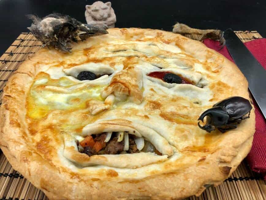 Spooky face meat pie.