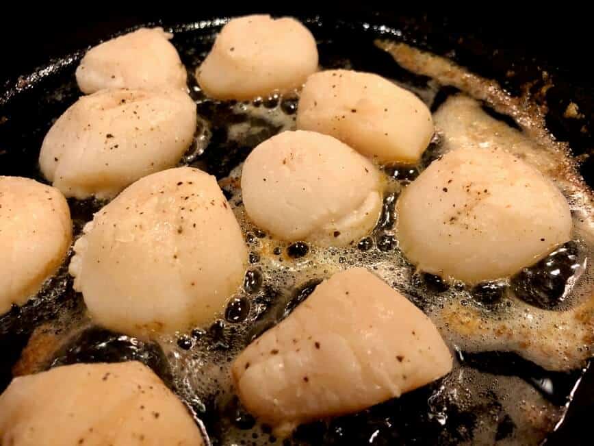 Candy from the Sea - Perfectly Cooked Scallops, Every Time - Scallops happily sizzling in butter and oil (Photo by Erich Boenzli)