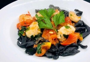 Squid Ink Pasta - Homemade Black Squid Ink Pasta with Seafood (Photo by Erich Boenzli)