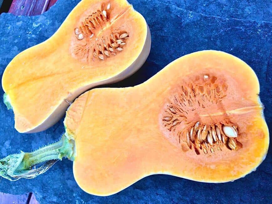 Ripe butternut squash, cut in half.