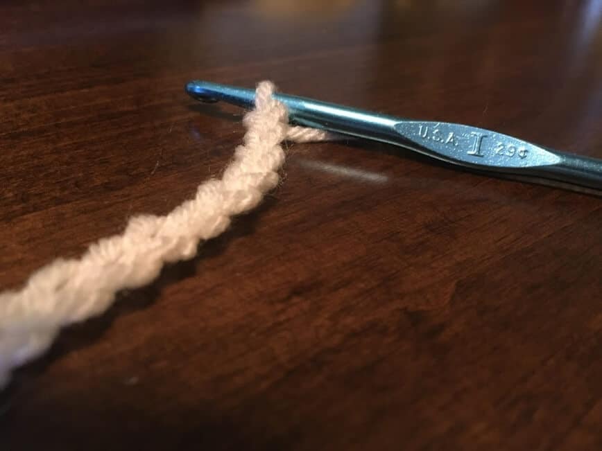Crochet hook, making a foundation chain.