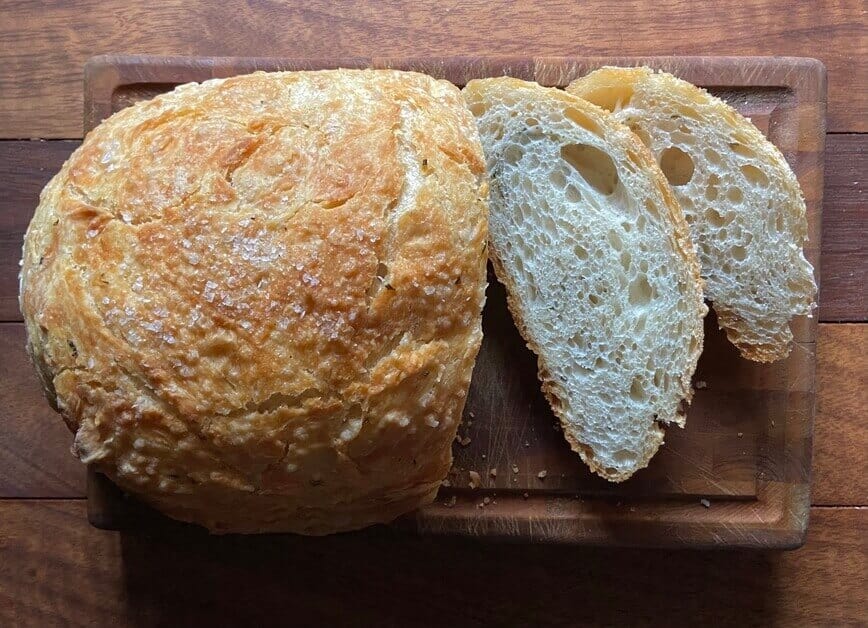 Sliced bread on a cutting board.