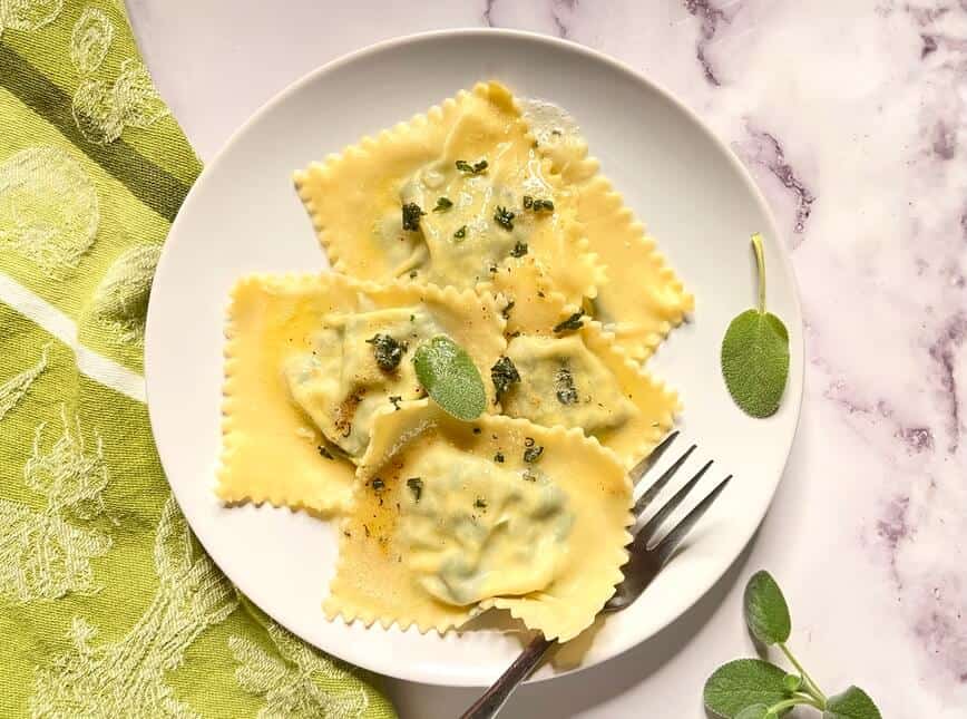 Homemade Spinach Ricotta Ravioli with Butter Sage Sauce (Photo by Viana Boenzli)