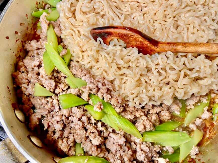 Ground Pork Ramen - adding cooked noodles to the pan (Photo by Erich Boenzli)