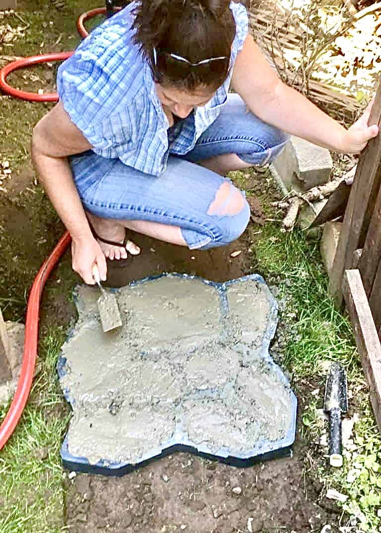 Viana molding the concrete.