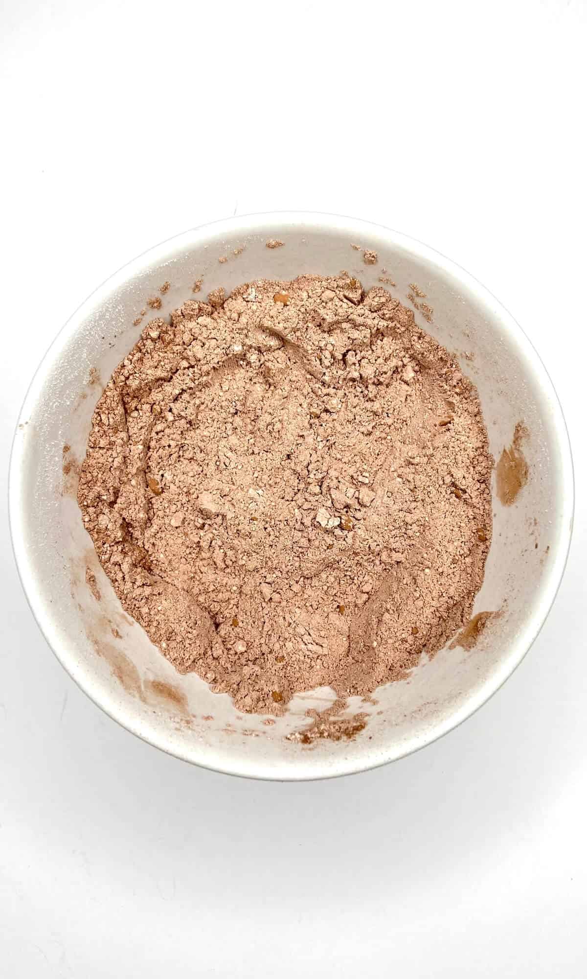 Flour and cocoa mixed in a bowl.