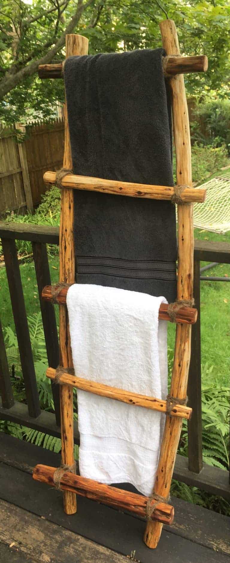 Ladder with towels over rungs.