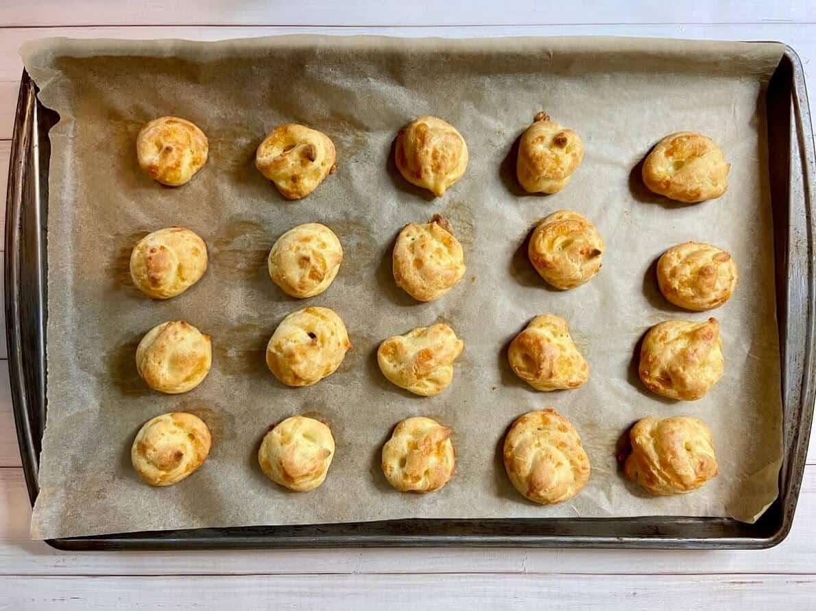 Pastry on a parchment lined baking sheet.