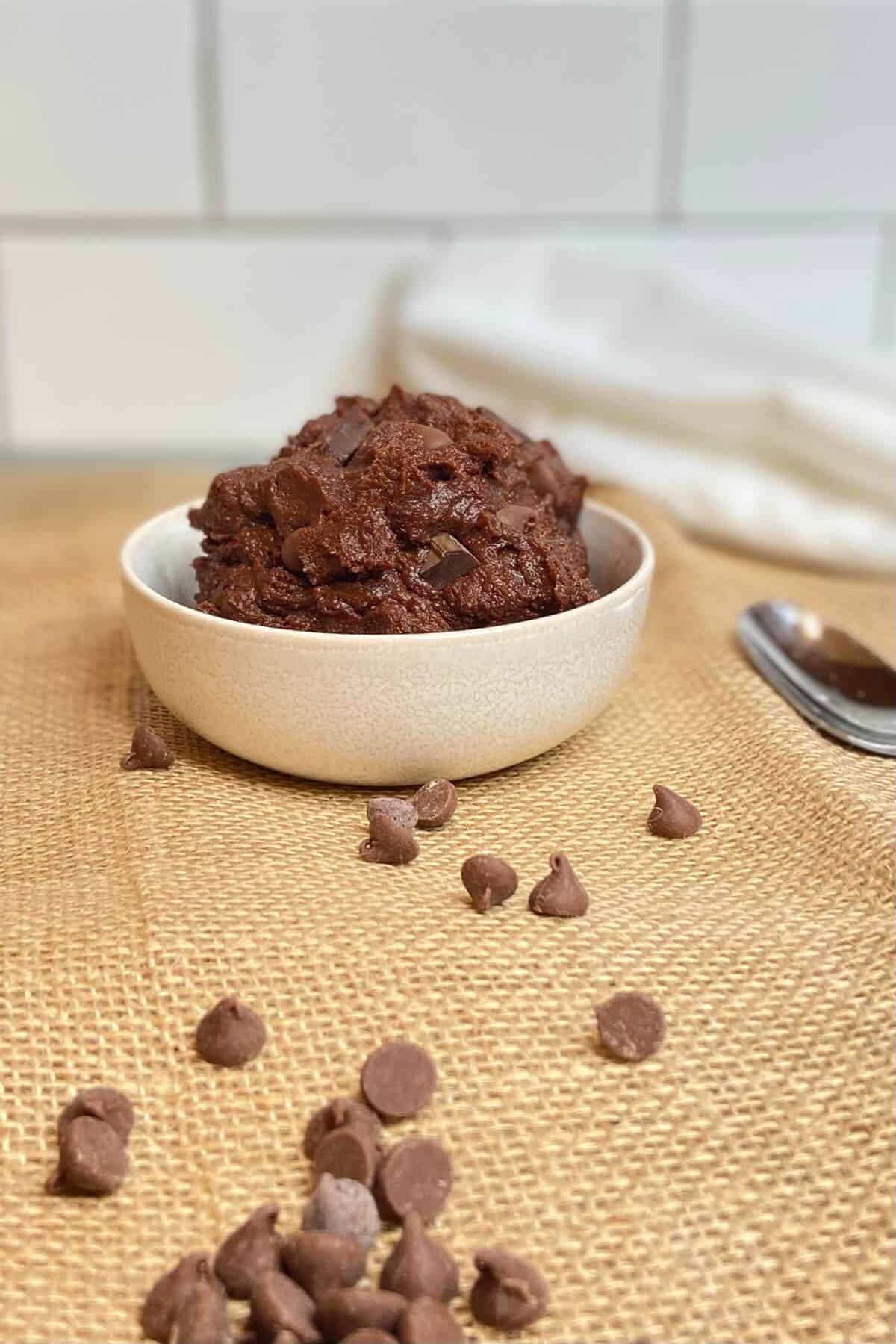 Served in a small bowl, with chocolate chips sprinkled on the table.