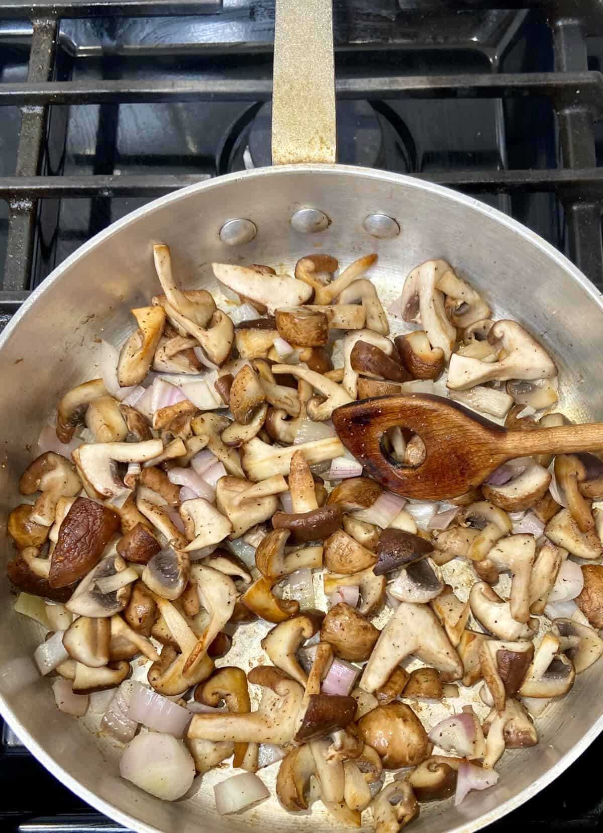 Sauteing mushrooms and shallots.
