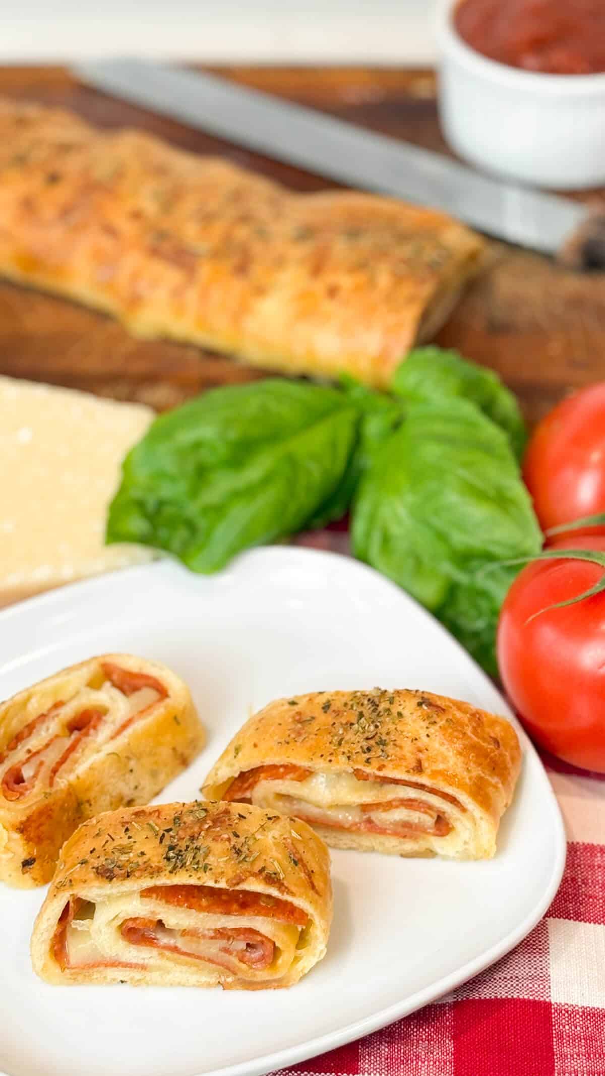 Pepperoni roll ready to serve, on a plate.