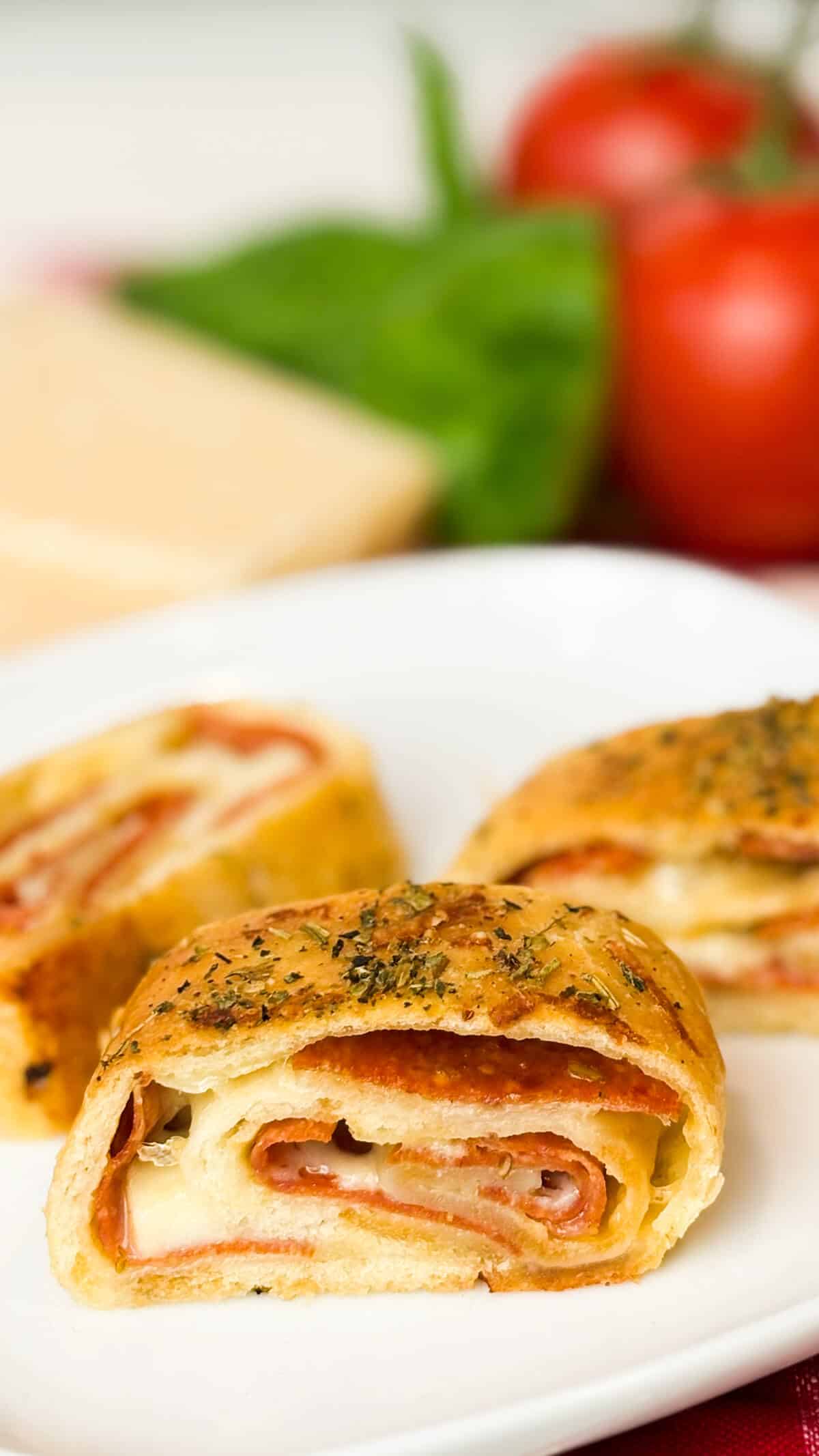 Sliced pepperoni roll bread stromboli.