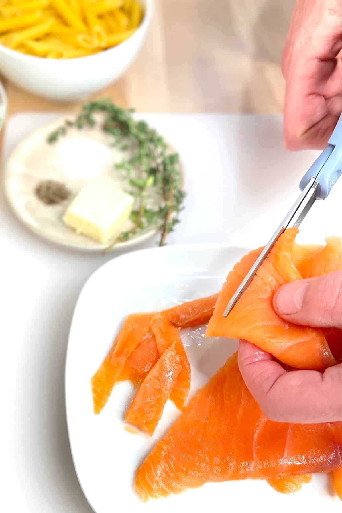 Use kitchen scissors to cut the salmon into ¼” to ½” strips.