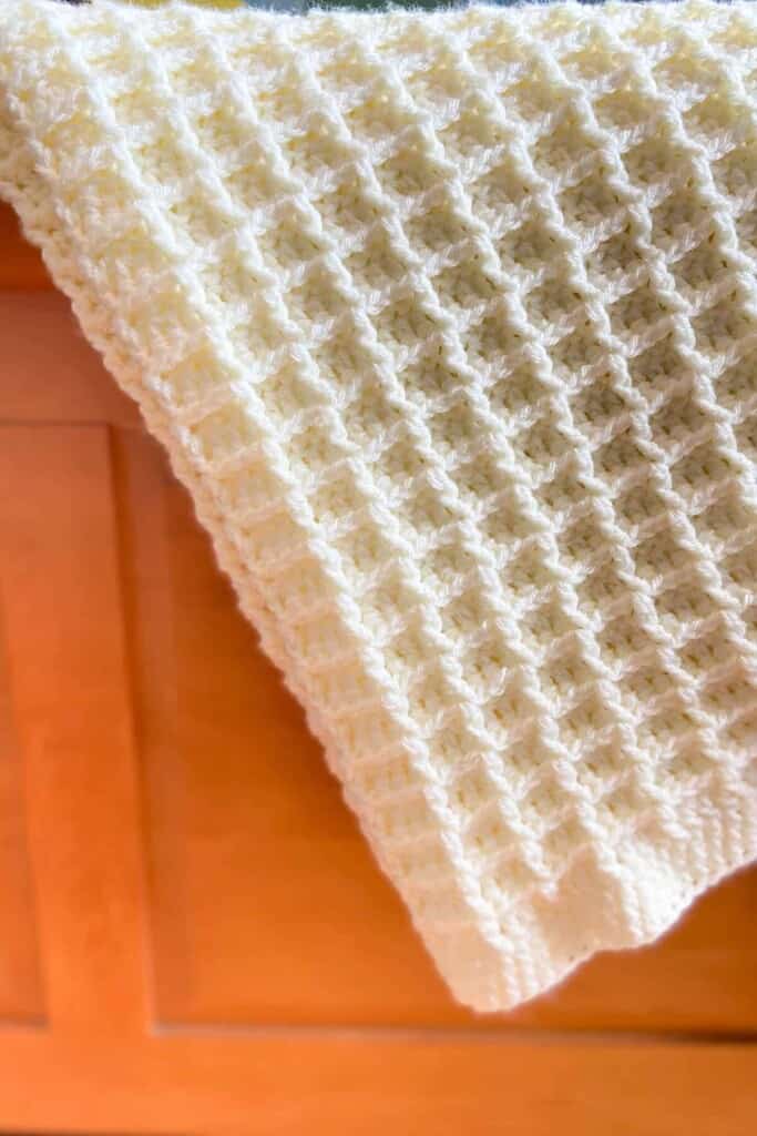 Waffle Stitch Crochet Blanket - over wood