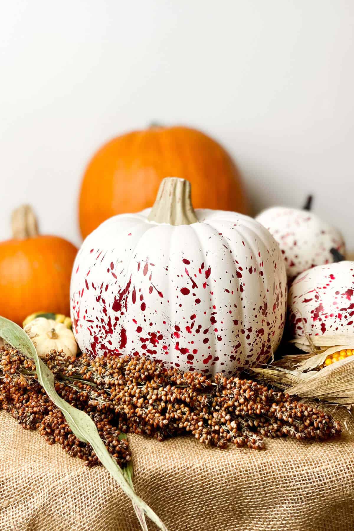 Finished paint splatter pumpkins.