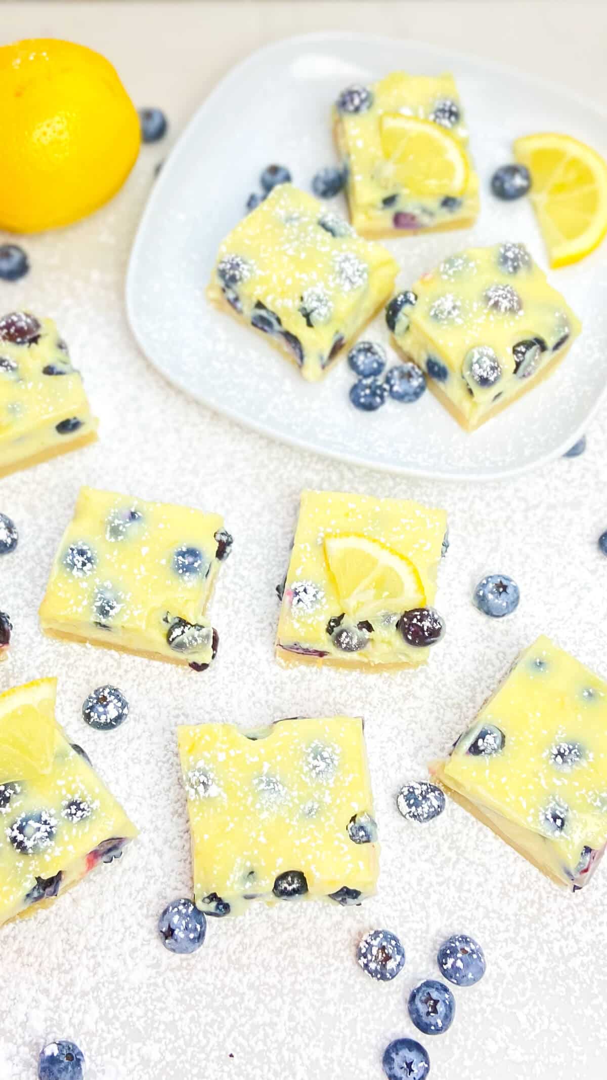 Cut squares of bars, with small slices of lemon on top.