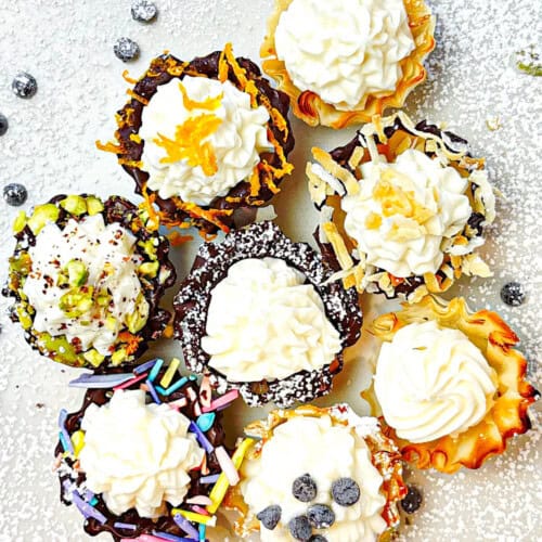Multiple toppings on cannoli bites.