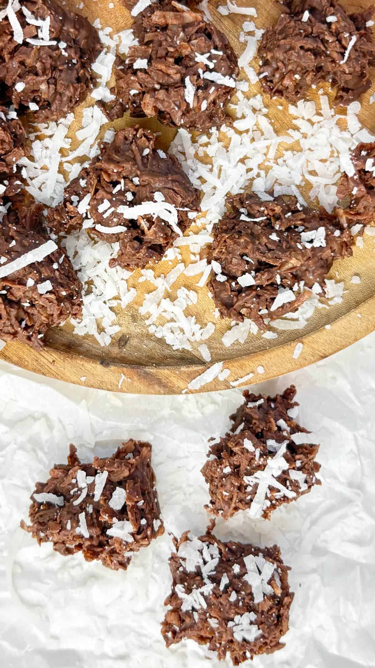 On a wood plate, with shredded coconut sprinkled on top.