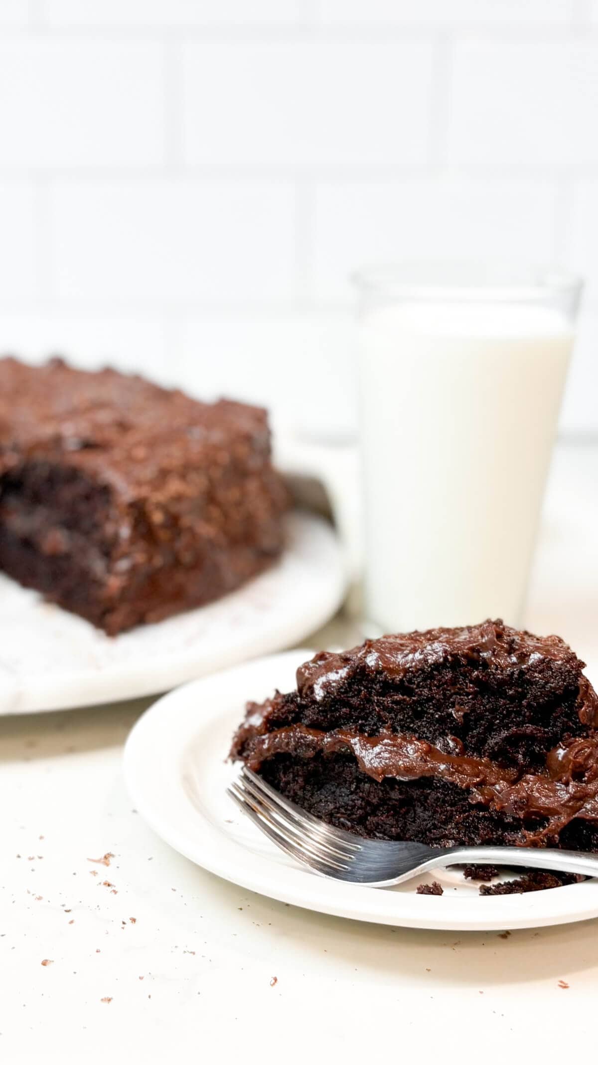 One slice of cake on a plate.