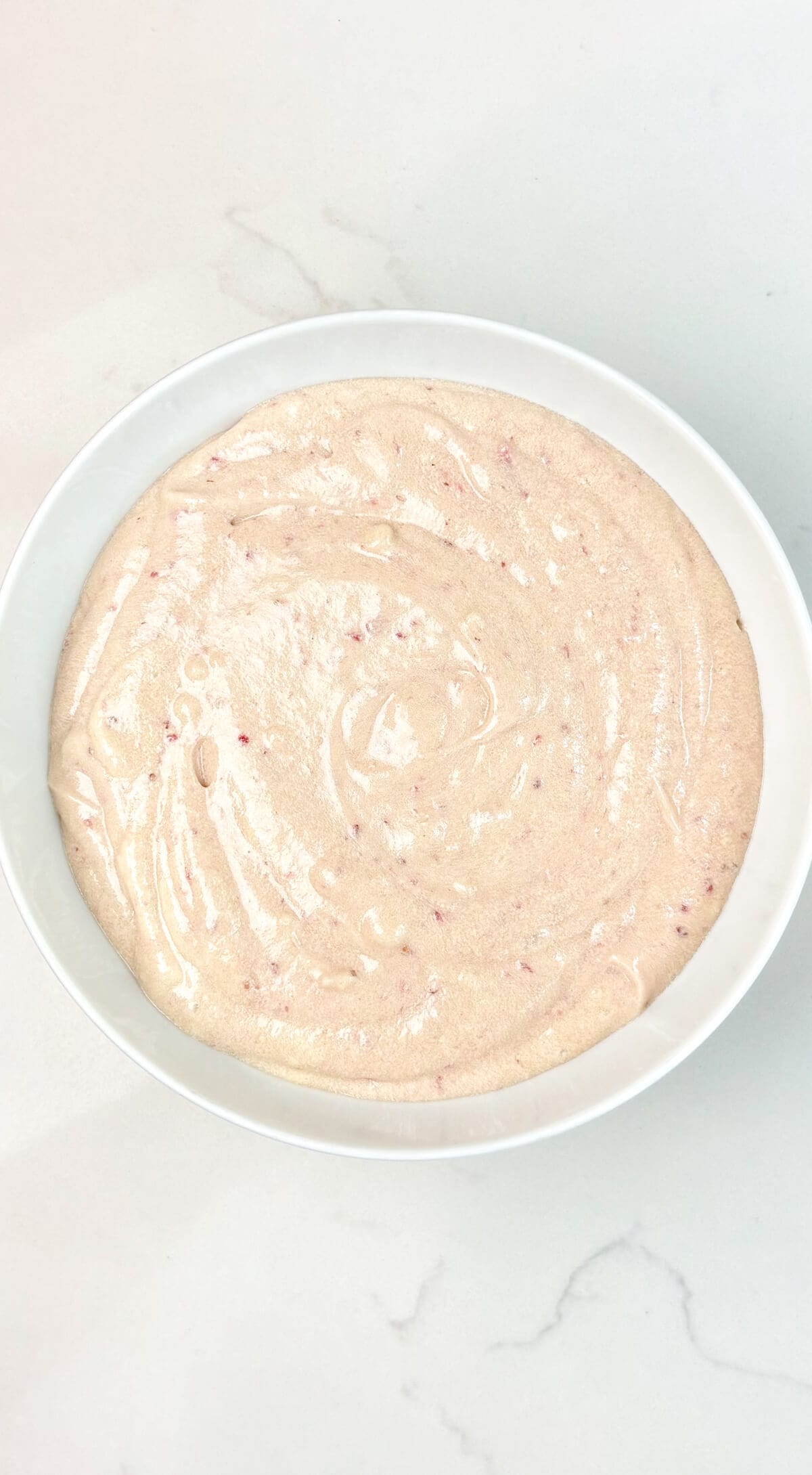 Cupcake batter, mixed in a bowl.