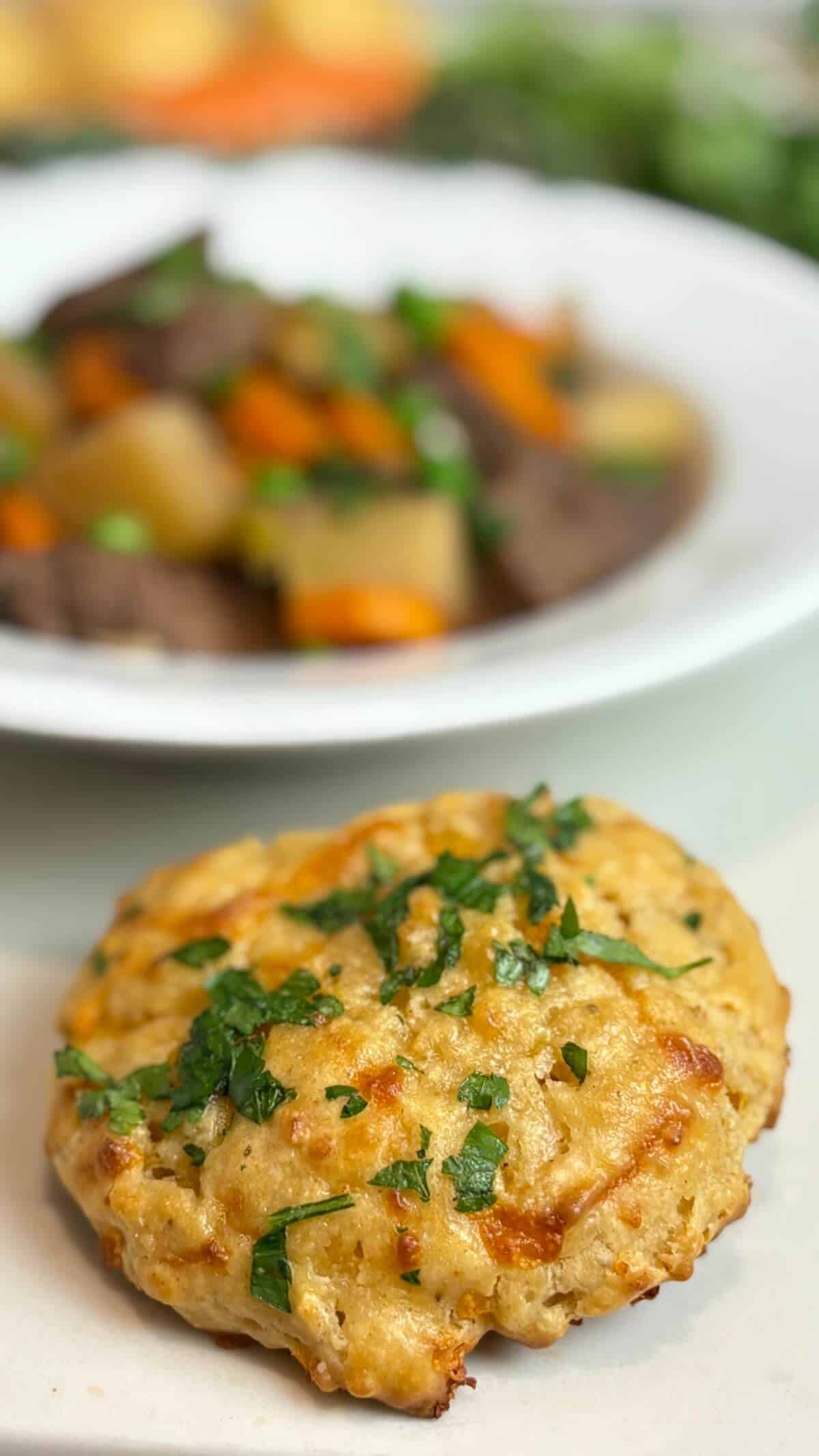 A biscuit served with stew.