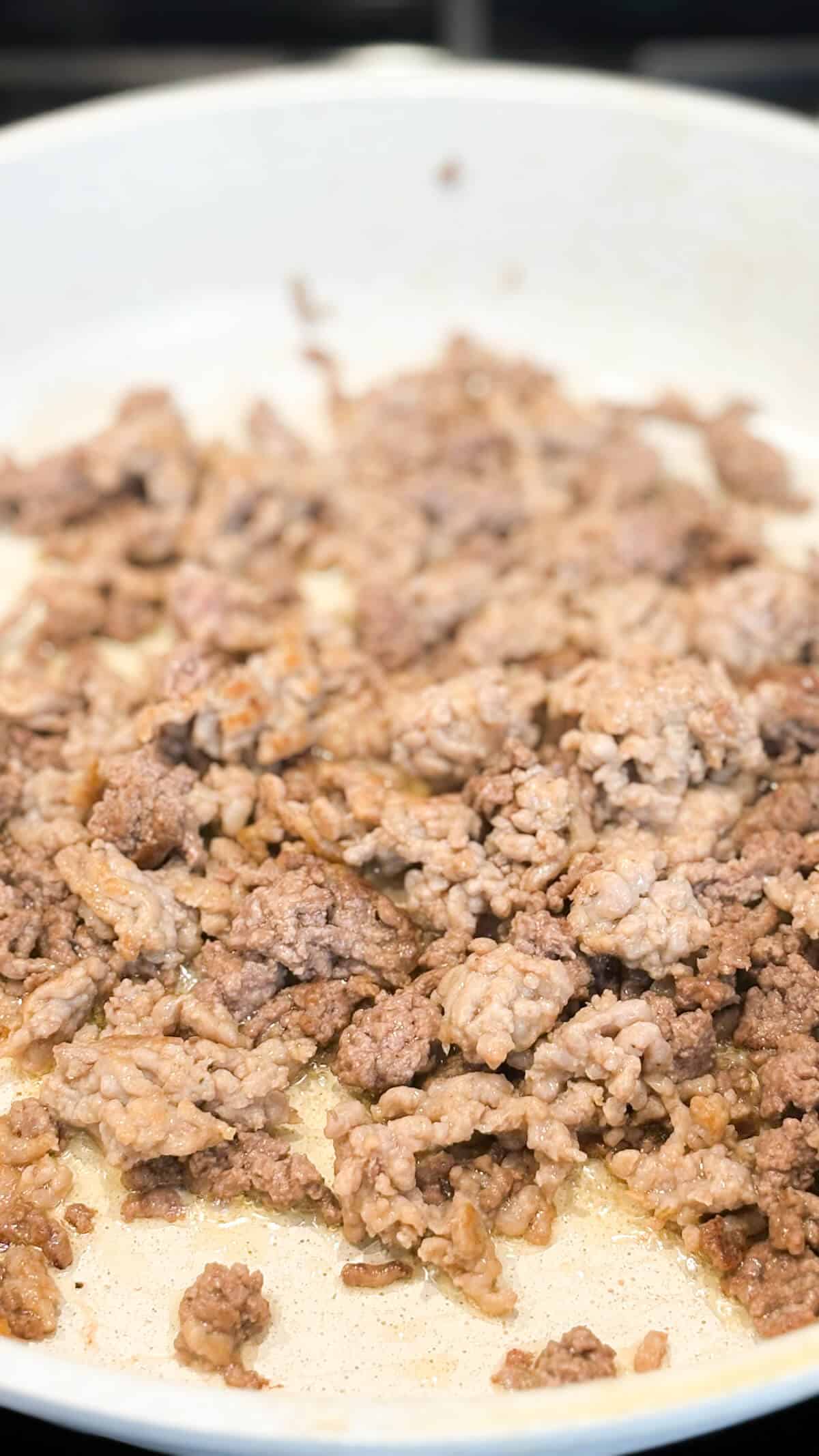 Browning ground beef and ground sausage.