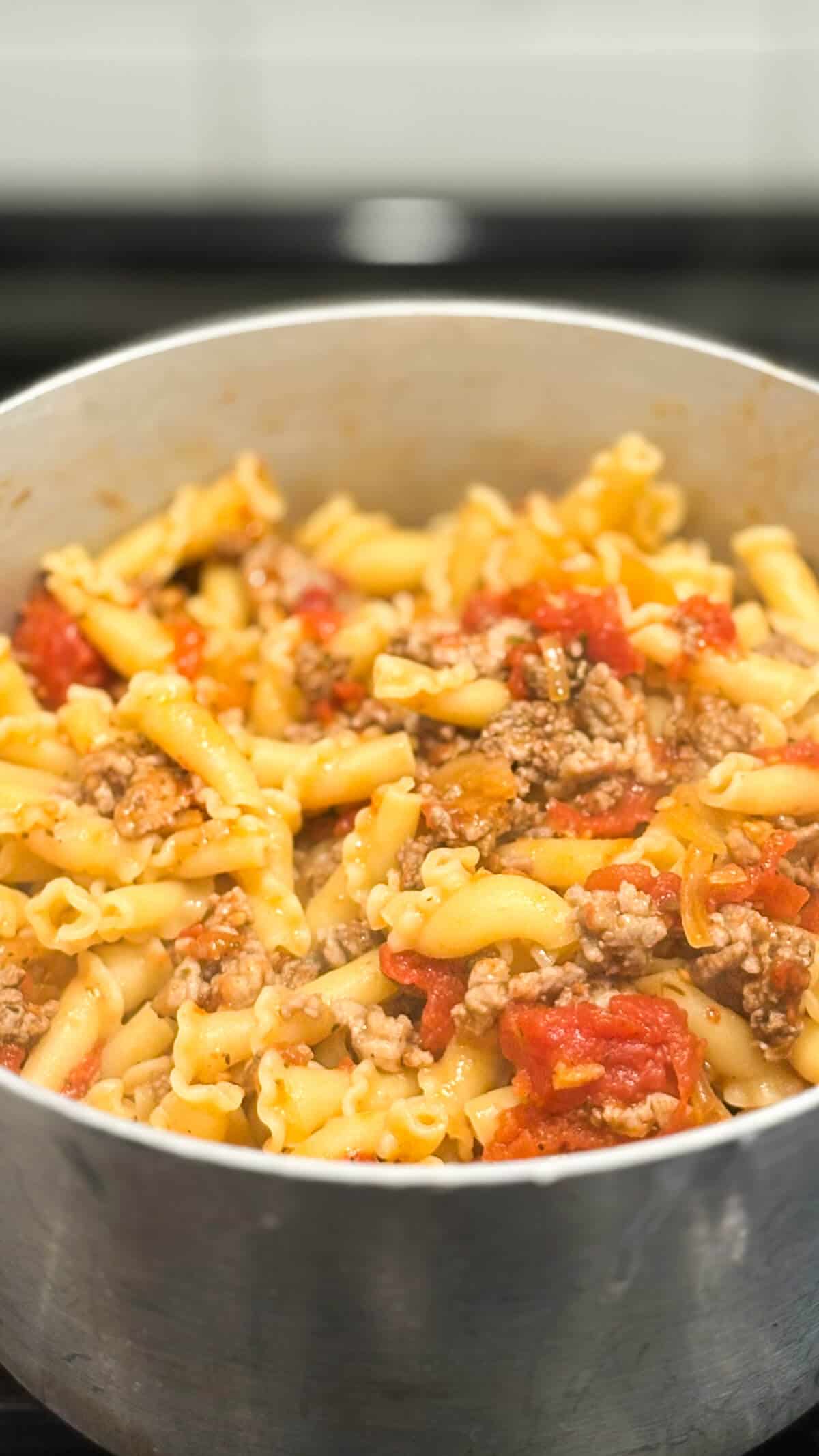 Pasta mixed with sauce.