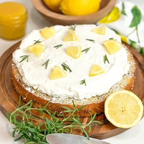 Lemon Rosemary Olive Oil Cake with Lemon Curd Whipped Cream Topping.