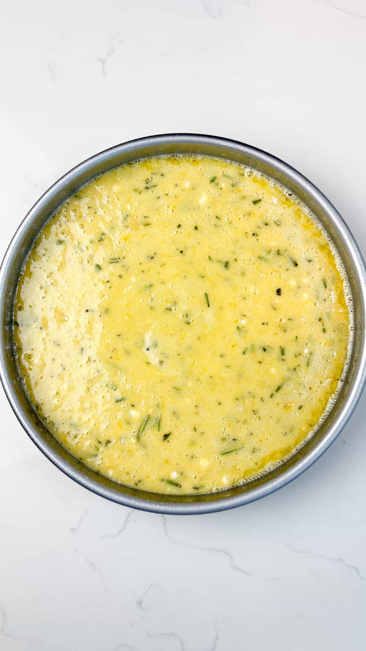 Batter poured into cake pan.