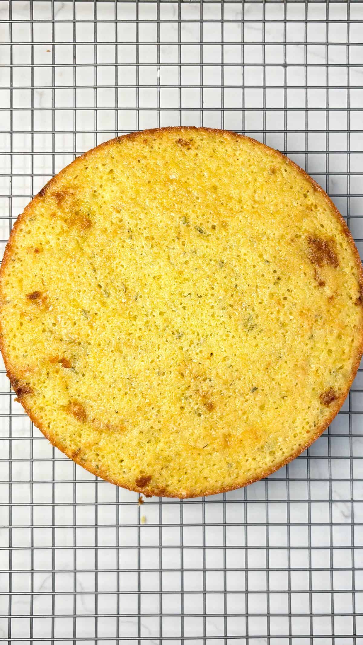 Cake cooling on a wire cooling rack.