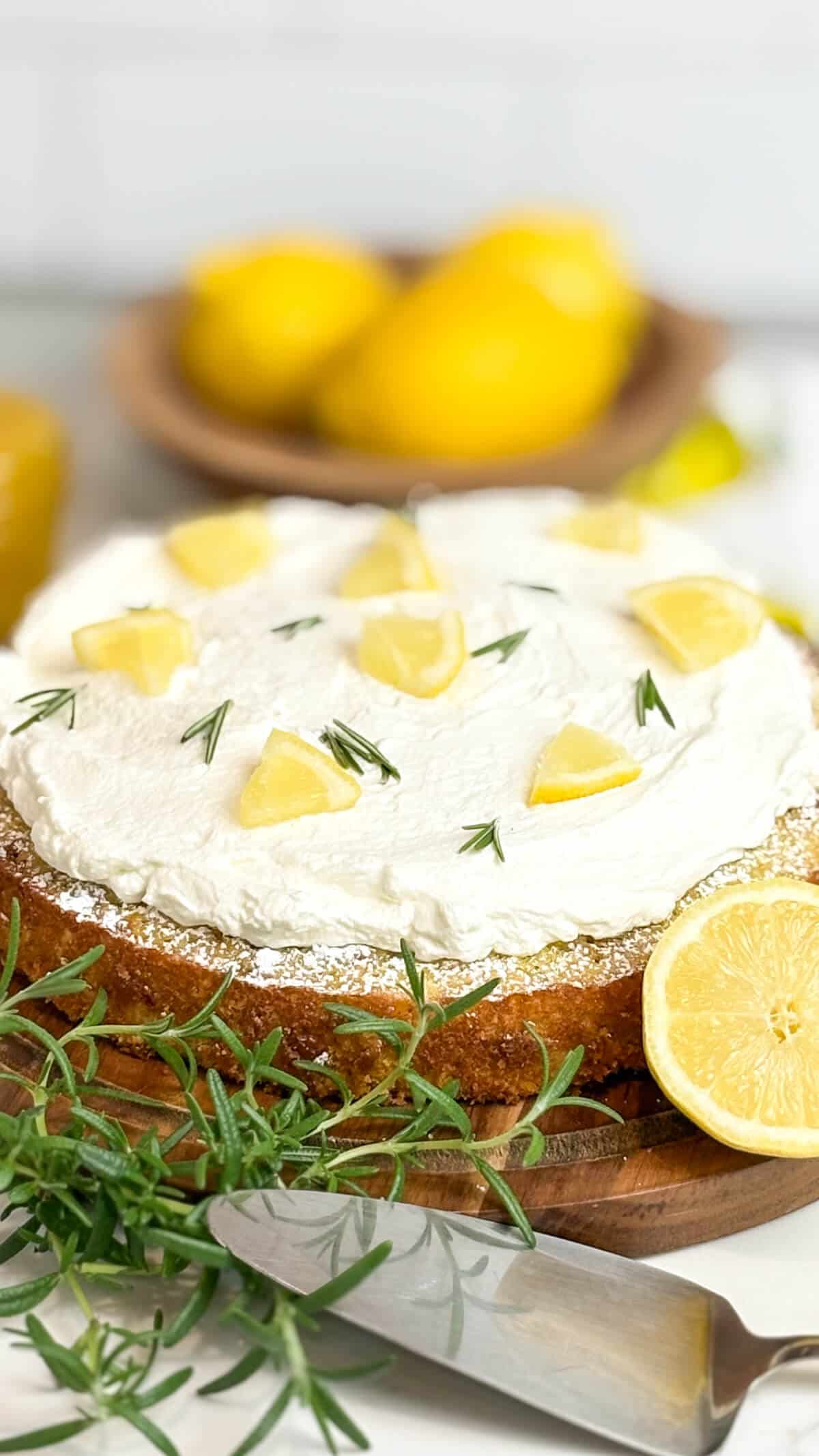 Finished cake with whipped cream topping.