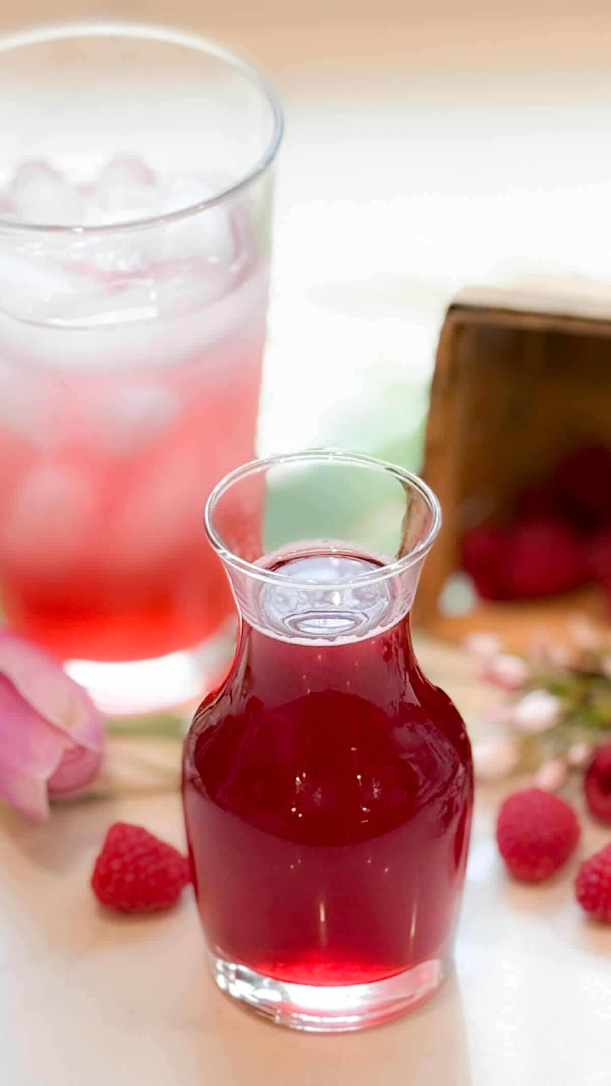 In small carafe.