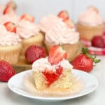 Strawberry Filled Cupcakes with Strawberry Buttercream Frosting.