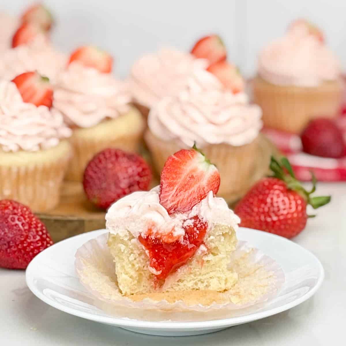 Strawberry Filled Cupcakes with Strawberry Buttercream Frosting.